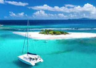 Maui Catamaran sailing in turquoise water